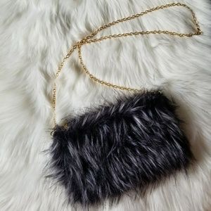 Faux fur clutch with attachable golden chain